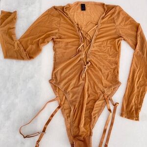 Frederick's of Hollywood Kids Bodysuit in Warm Tan